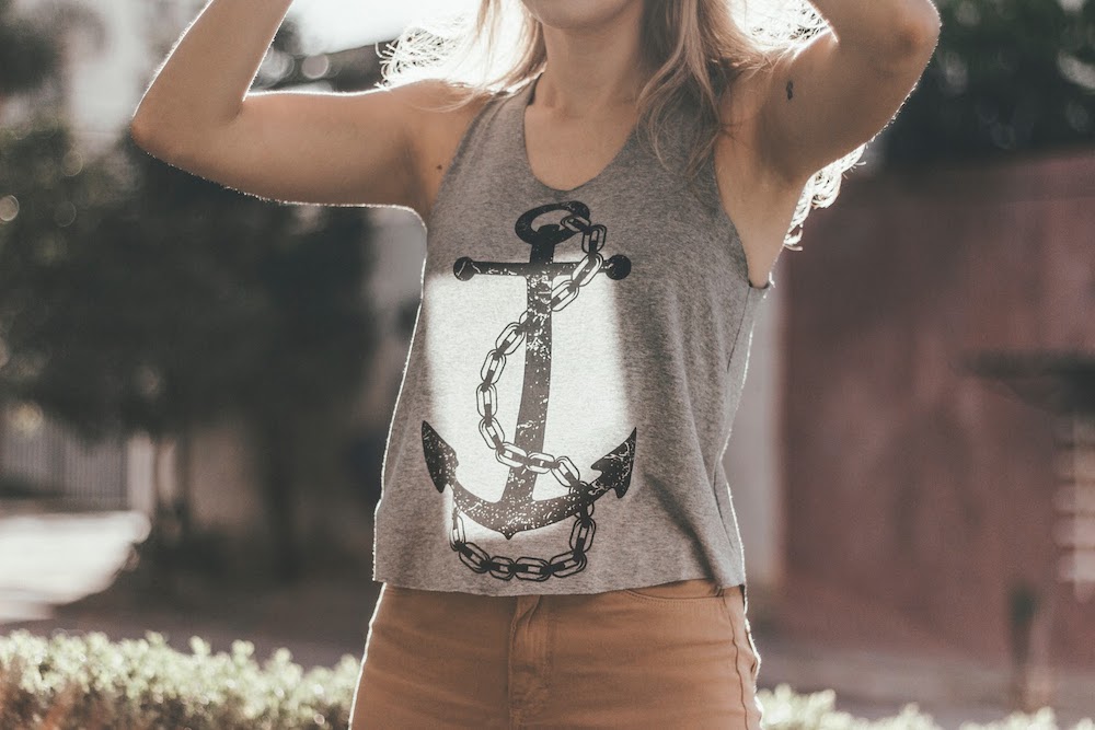 Woman wearing custom branded t-shirt - company culture